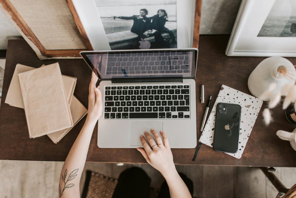 Employee using laptop to look up NJ sick leave laws