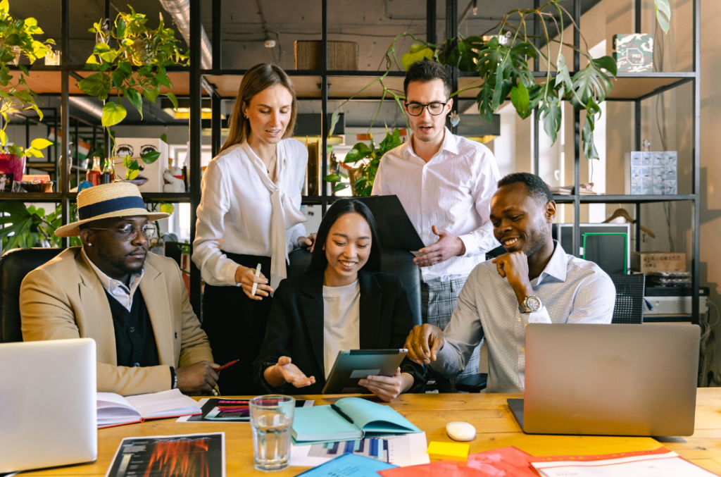 Diverse team in a creative work environment showcasing company culture.